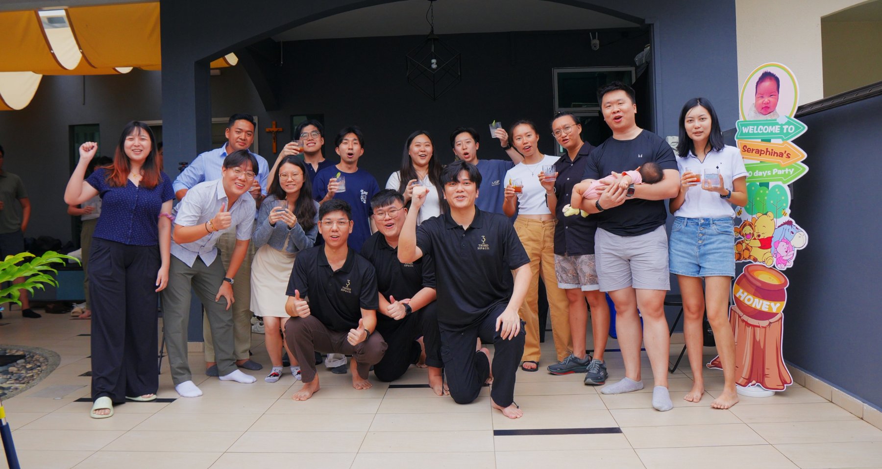 Guests and the 3rd Sip & Co team posing together at an event