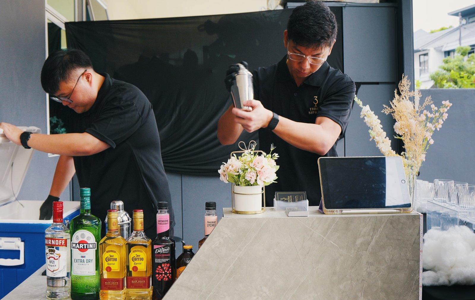 The founders of 3rd Sip & Co preparing drinks